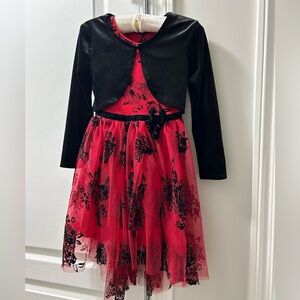 Red and black assymetrical dress with black shrug